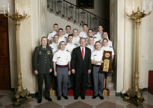 President George W. Bush stands with members of the U.S. Military Academy Rifle Team Thursday, April 6, 2006, during a photo opportunity with the 2005 and 2006 NCAA Sports Champions. White House photo by Eric Draper