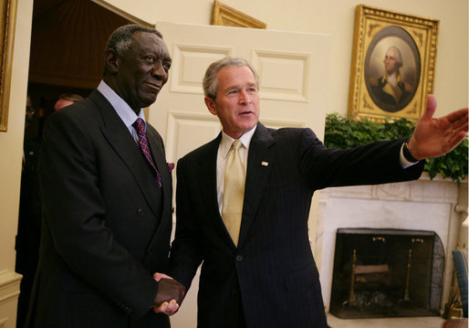 President George W. Bush welcomes Ghana President John Kufuor to the Oval Office at the White House, Wednesday, April 12, 2006, where President Bush complimented President Kufuor as a man of vision, strength and character in his leadership of Ghana. White House photo by Kimberlee Hewitt