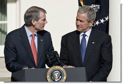 President George W. Bush stands with Rob Portman, his nominee as Director of the Office of Management and Budget during an announcement in the Rose Garden Tuesday, April 18, 2006. "The Office of Management and Budget is one of the most essential agencies of our government," said the President. "The OMB has a central responsibility of implementing the full range of my administration's agenda, from defense programs that will keep our people secure, to energy initiatives that will break our dependence on oil, to tax policies that keep our economy growing and creating jobs. White House photo by Paul Morse