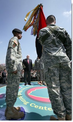 Vice President Dick Cheney participates in the awarding of the Valorous Unit Award to the First Brigade Combat Team, First Infantry Division during a rally for the troops at Fort Riley Army Base in Kansas, Tuesday, April 18, 2006. The award was given to the unit for their extraordinary heroism in Iraq.  White House photo by David Bohrer