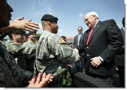 Vice President Dick Cheney greets soldiers at Fort Riley Army Base after delivering remarks at a rally for the troops, Tuesday, April 18, 2006. White House photo by David Bohrer