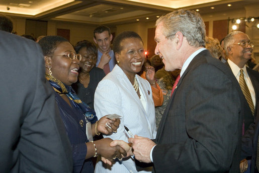 President George W. Bush greets members of the audience after speaking Wednesday, April 19, 2006, at Tuskegee University in Tuskegee, Alabama. White House photo by Paul Morse