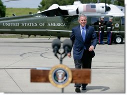 President George W. Bush walks to the podium before delivering a statement on the important milestone Iraqis reached today on their path to democracy, Saturday, April 22, 2006 in West Sacramento, California.  White House photo by Eric Draper