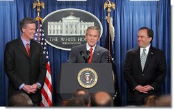 President George W. Bush and outgoing Press Secretary Scott McClellan introduces the new White House Press Secretary, Tony Snow, to the press in the James S. Brady Press Briefing Room Wednesday, April 26, 2006.  White House photo by Kimberlee Hewitt