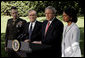 President George W. Bush makes a statement to the press regarding the recent trip to Iraq by Secretary Rumsfeld and Secretary Rice on the South Lawn May 1, 2006. The President is standing with, from left, Chairman of the Joint Chiefs of Staff Peter Pace, Defense Secretary Donald Rumsfeld and State Secretary Condoleezza Rice. White House photo by Eric Draper