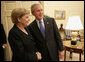 President George W. Bush welcomes German Chancellor Angela Merkel to the Oval Office at the White House, Wednesday, May 3, 2006. White House photo by Eric Draper