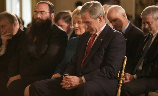 President George W. Bush is joined in prayer by Shirley Dobson, chairman of the National Day of Prayer Task Force, and Rabbi Sholom Ciment, the spiritual leader of Chabad-Lubavitch of Greater Boynton in Palm Beach County, Fla., during a celebration of National Prayer Day at the White House Thursday, May 4, 2006. White House photo by Eric Draper
