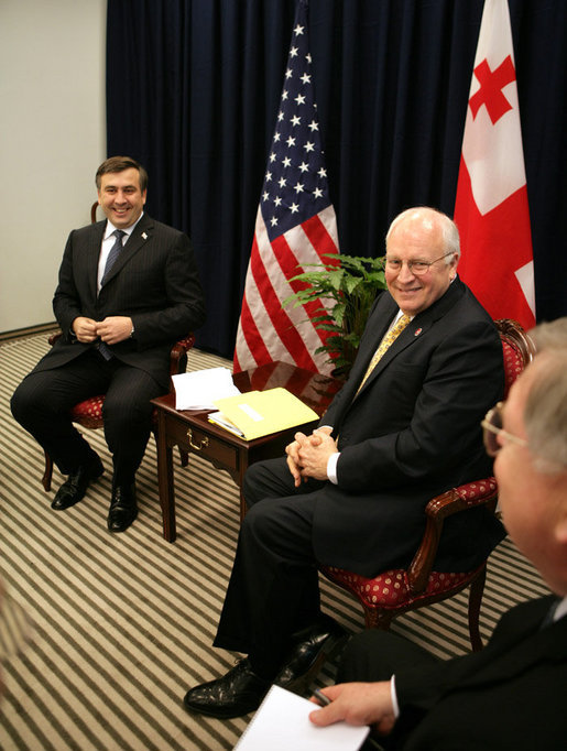 Vice President Dick Cheney and President Mikheil Saakashvili of Georgia, share a light moment with U.S. Ambassador John Tefft, right, during a bilateral meeting held during the Vilnius Conference 2006 in Vilnius, Lithuania, Thursday, May 4, 2006. White House photo by David Bohrer