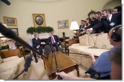 President George W. Bush visits with President Tabare Vazquez of Uruguay in the Oval Office Thursday, May 4, 2006. White House photo by Eric Draper