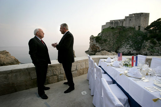 Vice President Dick Cheney talks with Croatian Prime Minister Ivo Sanader before a dinner meeting, Saturday, May 6, 2006, in the Old City of Dubrovnik, Croatia. The Vice President met with the Prime Minister to express U.S. support of Croatia's ambitions to become a member of the transatlantic community through integration into NATO and the European Community. White House photo by David Bohrer