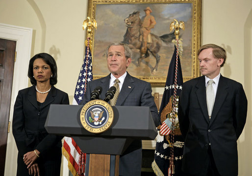 President George W. Bush delivers a statement on Darfur in the Roosevelt Room Monday, May 8, 2006. Standing with the President are State Secretary Condoleezza Rice and State Deputy Secretary Robert Zoellick. "About 200,000 people have died from conflict, famine and disease," said the President. "And more than 2 million were forced into camps inside and outside their country, unable to plant crops, or rebuild their villages. I've called this massive violence an act of genocide, because no other word captures the extent of this tragedy." White House photo by Paul Morse