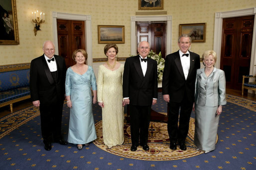 President George W. Bush, Laura Bush, Vice President Dick Cheney and Lynne Cheney stand with Australian Prime Minister John Howard and his wife Mrs. Janette Howard in the Blue Room for a photograph during the official dinner Tuesday, May 16, 2006. White House photo by Paul Morse