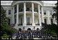 President George W. Bush and Laura Bush pose with the 2006 U.S. Winter Olympic and Paralympic teams during a congratulatory ceremony held on the South Lawn at the White House Wednesday, May 17, 2006. White House photo by Shealah Craighead