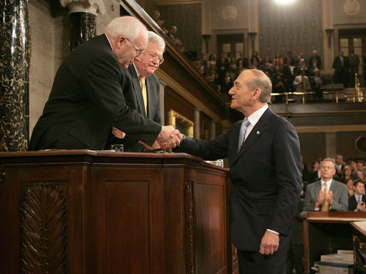 Vice President Dick Cheney congratulates Prime Minister Ehud Olmert of Israel, Wednesday, May 24, 2006, following the prime minister's remarks to a Joint Meeting of Congress at the U.S. Capitol. White House photo by David Bohrer