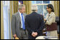 President George W. Bush talks with Secretary of State Condoleezza Rice and White House Chief of Staff Joshua Bolten in the Oval Office after receiving news of terrorist al Zarqawi's death in Iraq at 4:49 p.m. Wednesday, June 7, 2006. White House photo by Eric Draper