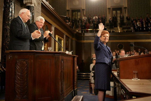 President Vaira Vike-Freiberga of Latvia acknowledges the applause of Vice President Dick Cheney, House Speaker Dennis Hastert and members of Congress, Wednesday, June 7, 2006, after an address to a Joint Meeting of Congress held in her honor at the U.S. Capitol in Washington. White House photo by David Bohrer