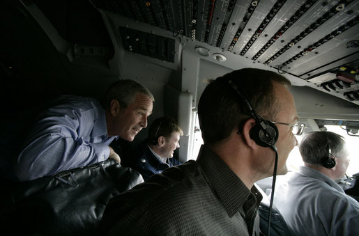 President George W. Bush rides in the cockpit of Air Force One on the final approach before landing in Baghdad Tuesday, June 13, 2006. White House photo by Eric Draper
