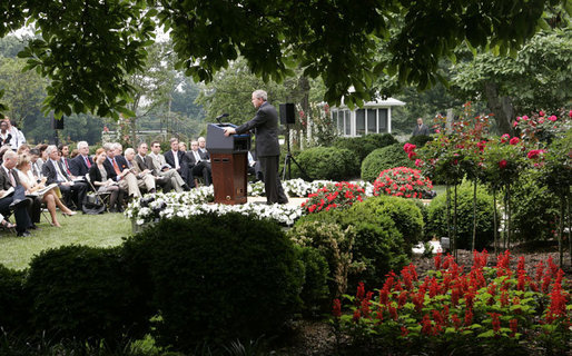 President George W. Bush speaks with reporter’s Wednesday morning, June 14, 2006, during a news conference in the Rose Garden, following his trip to Iraq where he met with members of the Iraq government and U.S. troops. White House photo by Paul Morse