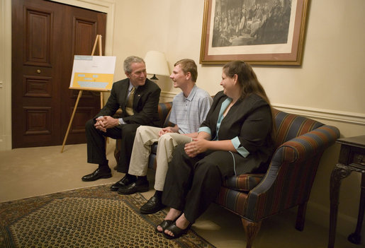 President George W. Bush meets with miner Randal McCloy Jr., and his wife Anna in the Eisenhower Executive Office Building Thursday, June 15, 2006, before signing S. 2803, the Mine Improvement and New Emergency Response Act. Mr. McCloy survived a January 2006 mining accident that left 12 others dead in Sago, West Virginia. White House photo by Eric Draper
