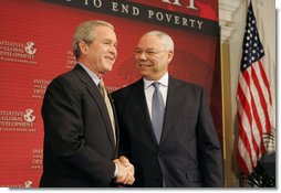 President George W. Bush is introduced by former Secretary of State Colin Powell at the Initiative for Global Development's 2006 National Summit in Washington, D.C., Thursday, June 15, 2006. "We have a moral duty to care for those who hurt here at home, and we have a moral duty to care for those as best as we can for those abroad, said the President. "That's part of the foreign policy of our country." White House photo by Kimberlee Hewitt