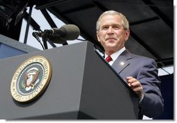 President George W. Bush delivers the commencement address during the graduation ceremony at the United States Merchant Marine Academy at Kings Point, New York, Monday, June 19, 2006. “In times of peace, the Merchant Marine helps ensure our economic security by keeping the oceans open to trade,” said the President. “In times of war, the Merchant Marine is the lifeline of our troops overseas, carrying critical supplies, equipment, and personnel.”  White House photo by Kimberlee Hewitt