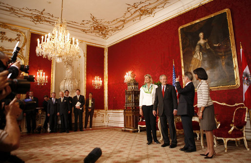 President George W. Bush and Austria's President Heinz Fischer stand with Ursula Plassnik, Austria's Federal Minister of Foreign Affairs, and Secretary of State Condoleezza Rice at the Hofburg Palace in Vienna Wednesday, June 21, 2006. The President will participate in a U.S. - European Union meeting before heading to Budapest. White House photo by Paul Morse