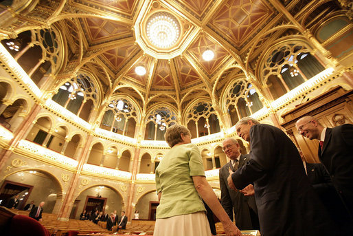 President George W. Bush talks with Hungarian political leaders inside the conference hall of the Hungarian Parliament building in Budapest, Hungary, Thursday, June 22, 2006. White House photo by Eric Draper