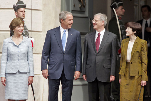 President George W. Bush, Mrs. Laura Bush, Hungarian President Laszlo Solyom and Mrs. Erzsebet Solyom participate in an official arrival ceremony at Sandor Palace in Budapest, Hungary, June 22, 2006. White House photo by Paul Morse
