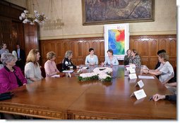 Mrs. Laura Bush and Dr. Klara Dobrev, wife of Hungarian Prime Minister Ferenc Gyurcsanys, participate in a roundtable discussion about breast cancer awareness in Budapest, Hungary, Thursday, June 22, 2006. White House photo by Shealah Craighead