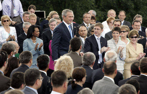 President George W. Bush walks to the podium to deliver remarks from Gellert Hill in Budapest, Hungary, Thursday, June 22, 2006. "Laura and I are honored to visit your great nation," said President Bush. "Hungary sits at the heart of Europe. Hungary represents the triumph of liberty over tyranny, and America is proud to call Hungary a friend." White House photo by Paul Morse