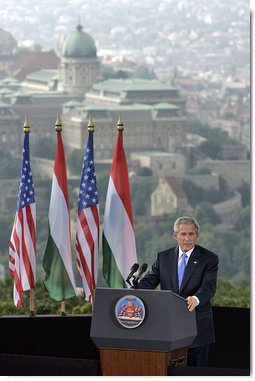 President George W. Bush speaks from Gellert Hill in Budapest, Hungary, Thursday, June 22, 2006. "Fifty years ago, you could watch history being written from this hill. In 1956, the Hungarian people suffered under a communist dictatorship and domination by a foreign power," said President Bush. "That fall, the Hungarian people had decided they had had enough and demanded change." White House photo by Paul Morse