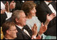 President George W. Bush and Mrs. Laura Bush join the audience in applauding the entertainment Sunday evening, June 25, 2006, at the annual Ford's Theater gala to benefit the historic theater. The program, 