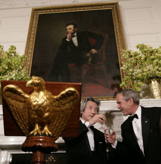 President George W. Bush and Japanese Prime Minister Junichiro Koizumi exchange toasts Thursday evening, June 29, 2006, during an official dinner in the State Dining Room at the White House in honor of the Prime Minister’s visit to the United States. White House photo by Eric Draper