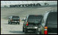 The motorcade of Vice President Dick Cheney takes a lap around the Daytona International Speedway in Daytona, Fla., Saturday, July 1, 2006, as the Vice President arrived to attend the 2006 Pepsi 400 NASCAR race. White House photo by David Bohrer