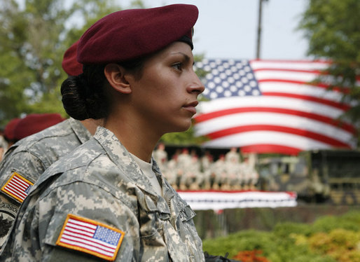 A U.S. Army Airborne soldier listens to President George W. Bush address troops and their family members Tuesday, July 4, 2006, during an Independence Day celebration at Fort Bragg in North Carolina. White House photo by Paul Morse