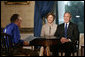 President George W. Bush and Laura Bush join CNN’s Larry King at an interview Thursday, July 6, 2006 in the Blue Room at the White House. White House photo by Eric Draper
