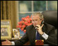 President George W. Bush speaks to Russian President Vladimir Putin during a morning telephone call Thursday, July 6, 2006, from the Oval Office of the White House. White House photo by Kimberlee Hewitt