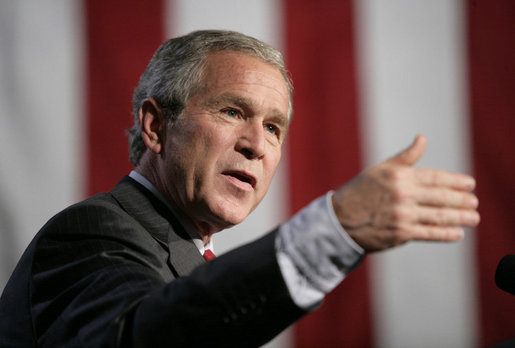 President George W. Bush gestures as he addresses a news conference at the Museum of Science and Industry in Chicago, Friday, July 7, 2006, speaking on the economy, immigration reform and security issues. White House photo by Eric Draper