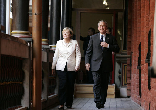 Chancellor Angela Merkel and President George W. Bush walk to their meeting after the arrival ceremony in Stralsund, Germany, Thursday, July 13, 2006. White House photo by Paul Morse