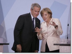 President George W. Bush and Chancellor Angela Merkel hold a joint press conference in Stralsund, Germany, Thursday, July 13, 2006.  White House photo by Paul Morse