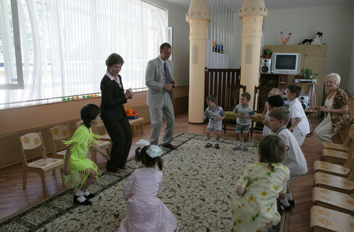 Mrs. Laura Bush dances with youngsters Friday, July 14, 2006, at the Pediatric HIV/AIDS Clinical Center of Russia in St. Petersburg, Russia. White House photo by Shealah Craighead