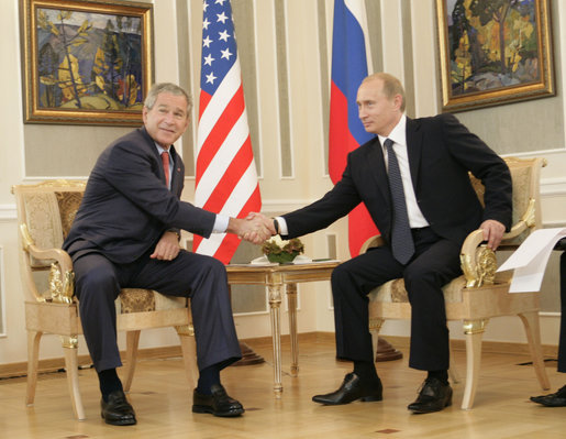 President George W. Bush and Russia's President Vladimir Putin shake hands before their G8 bilateral meeting Saturday, July 15, 2006, at the Konstantinovsky Palace Complex in Strelna, Russia. White House photo by Eric Draper