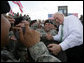 Vice President Dick Cheney shakes hands and poses for photographs with soldiers from the Army’s 3rd Infantry Division during a rally at Fort Stewart, Ga., Friday, July 21, 2006. White House photo by David Bohrer