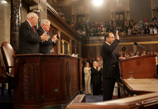 Prime Minister of Iraq Nouri al-Maliki responds to a welcome from Vice President Dick Cheney, House Speaker Dennis Hastert, and Congressional members before addressing a Joint Meeting of Congress, Wednesday, July 26, 2006, at the U.S. Capitol in Washington, D.C. Prime Minister Maliki, the first democratically elected prime minister of Iraq since the fall of Saddam Hussein, is on his first visit to Washington and met with President Bush yesterday to discuss the future development and security of Iraq. White House photo by David Bohrer