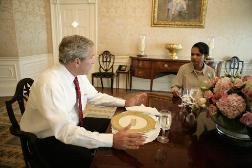 President George W. Bush meets with U.S. Secretary of State Condoleezza Rice at the White House Monday evening, July 31, 2006, to discuss her recent trip to the Middle East. White House photo by Eric Draper