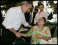 President George W. Bush meets with customers at the Versailles Restaurant and Bakery in Miami following his breakfast meeting with local business leaders Monday, July 31, 2006. White House photo by Kimberlee Hewitt