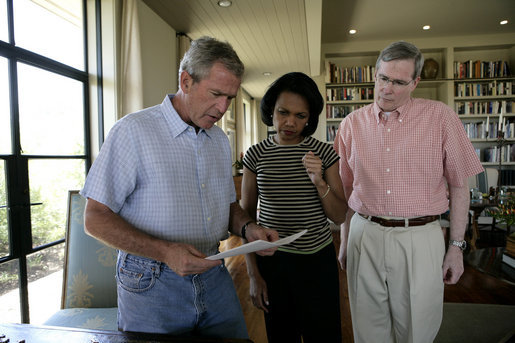 President George W. Bush meets with Secretary of State Condoleezza Rice and National Security Advisor Stephen Hadley at the Bush Ranch to discuss the Middle East, Saturday, Aug. 5, 2006. White House photo by Eric Draper