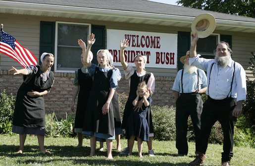 An excited group of Amish and Mennonite residents wave to President George W. Bush Wednesday, Aug. 16, 2006 in Lancaster, Pa., upon his arrival aboard Marine One. White House photo by Kimberlee Hewitt