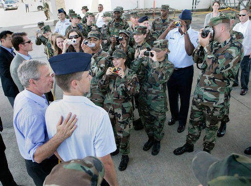 President George W. Bush meets military personnel upon his arrival Monday, Aug. 28, 2006, to Kessler Air Force Base in Biloxi, Miss., his first stop during a two-day visit to Biloxi and New Orleans to commemorate the one-year anniversary of Hurricane Katrina. White House photo by Eric Draper