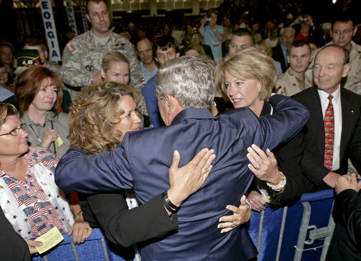 President George W. Bush greets audience members during his visit to the 88th Annual American Legion National Convention in Salt Lake City Thursday, Aug. 31, 2006. White House photo by Eric Draper